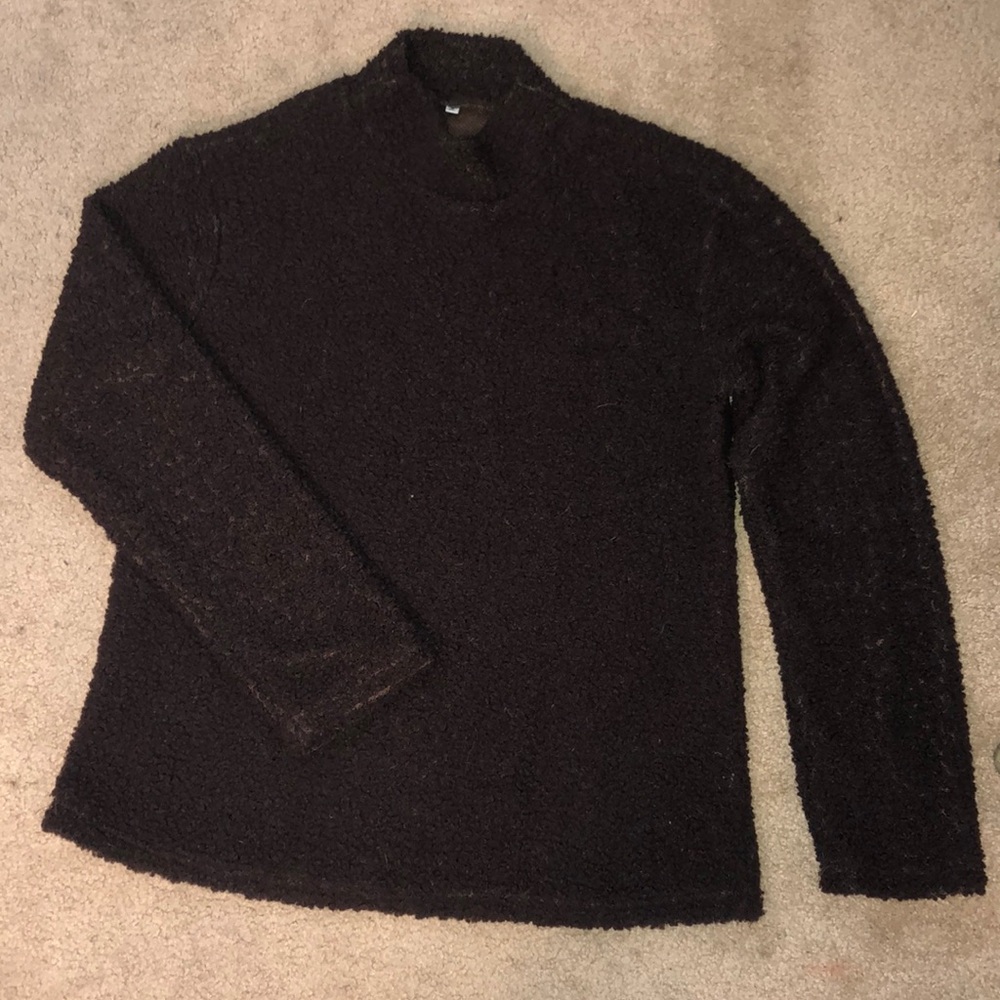 Brown fuzzy turtleneck sweater